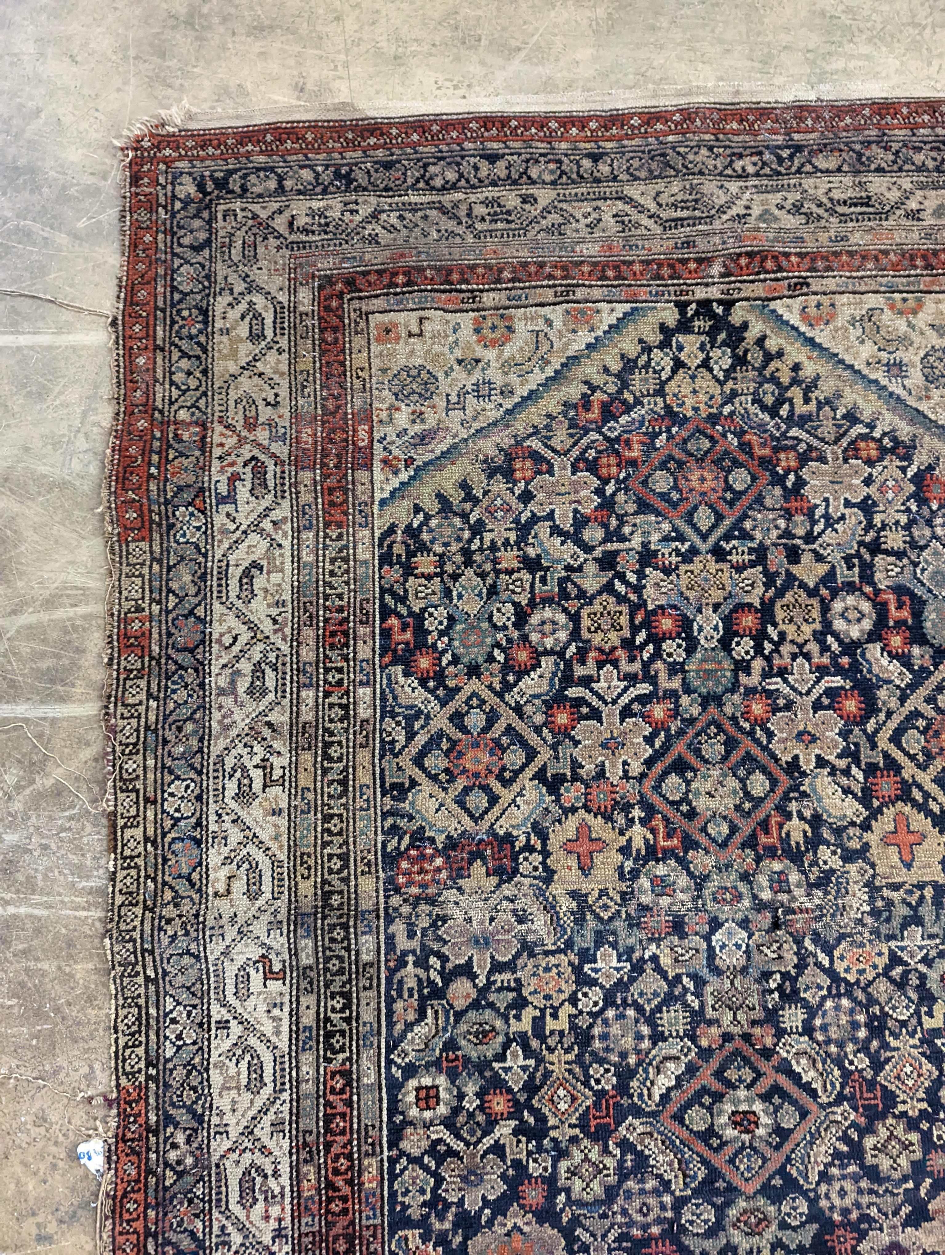 A North West Persian blue ground rug, 190 x 127cm